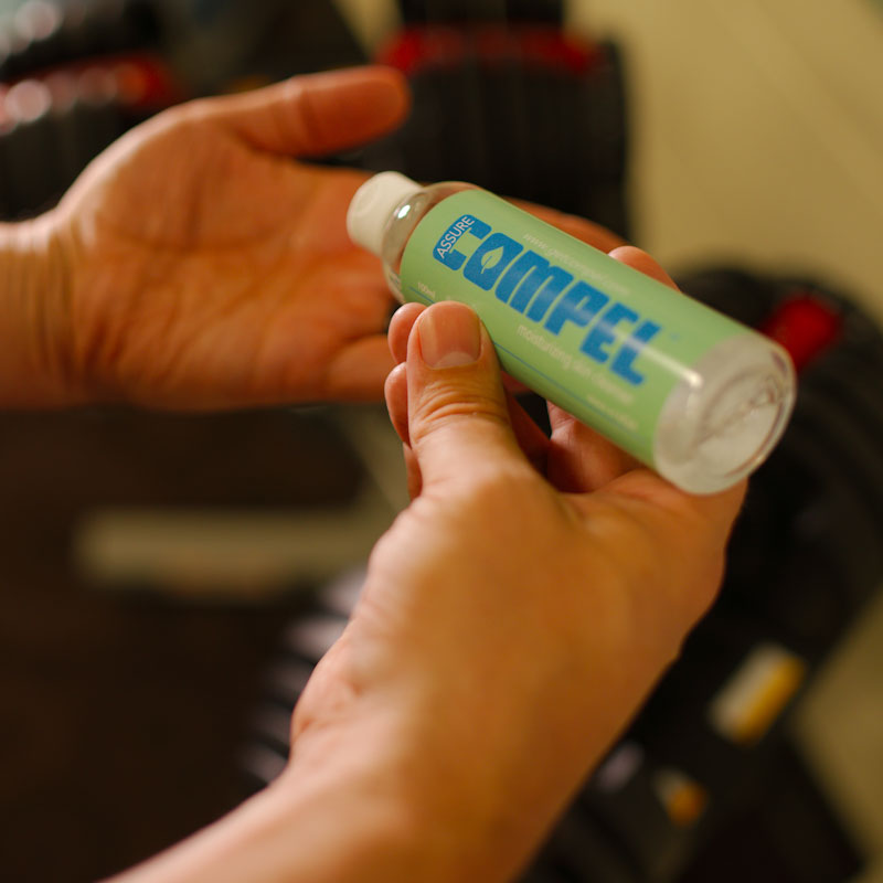Athlete hands with COMPEL ASSURE alcohol-free skin cleanser